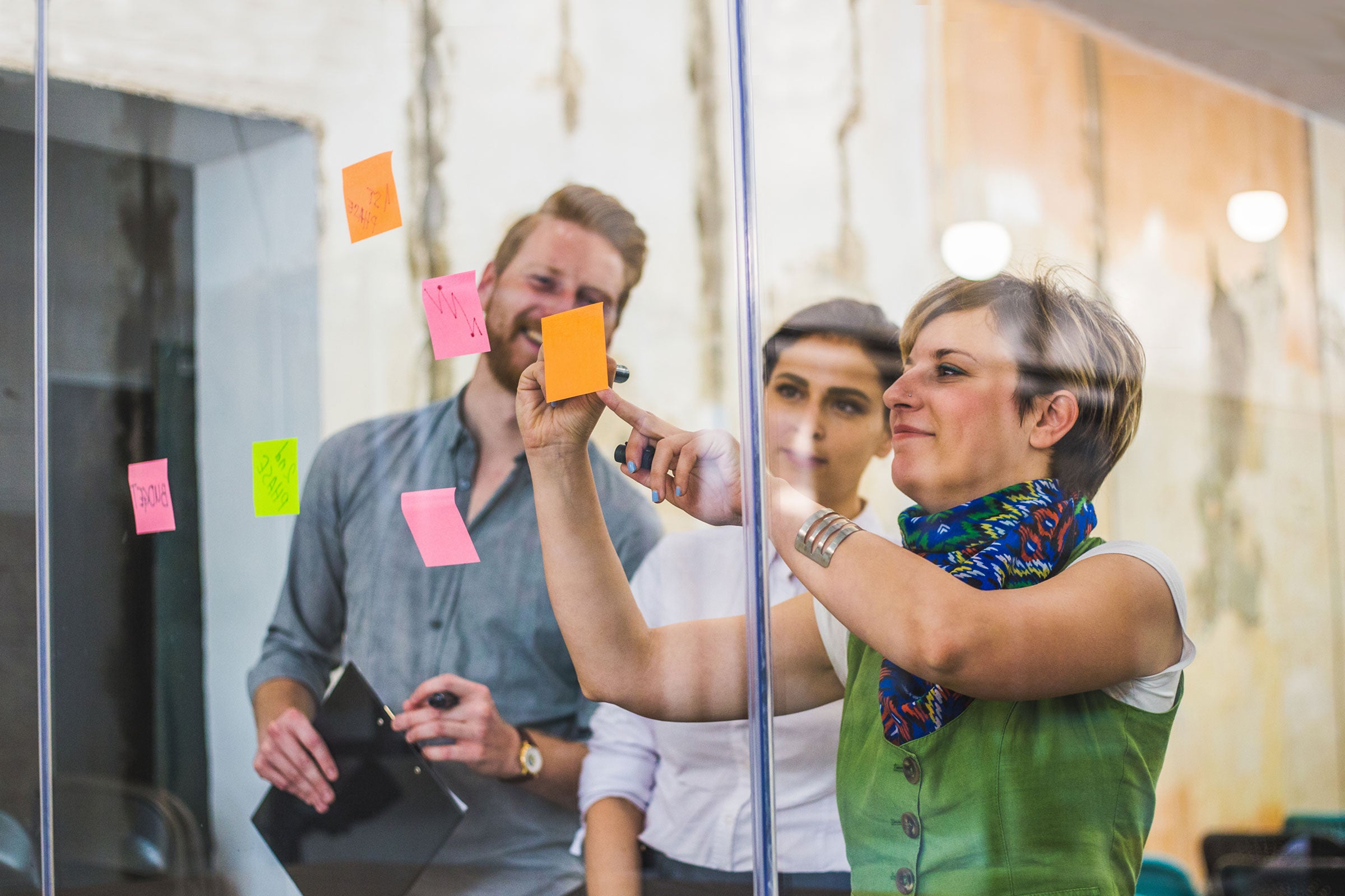 Team collaborating on post-its