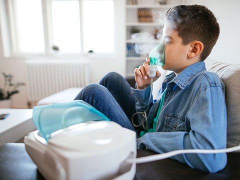 Child using a nebulizer