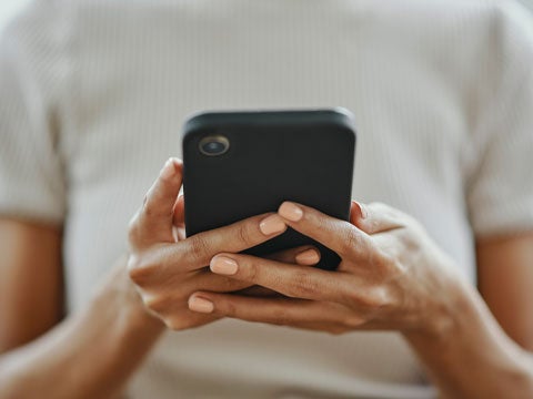 Closeup of a person using a smart phone