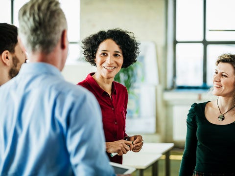 Four people having a discussion