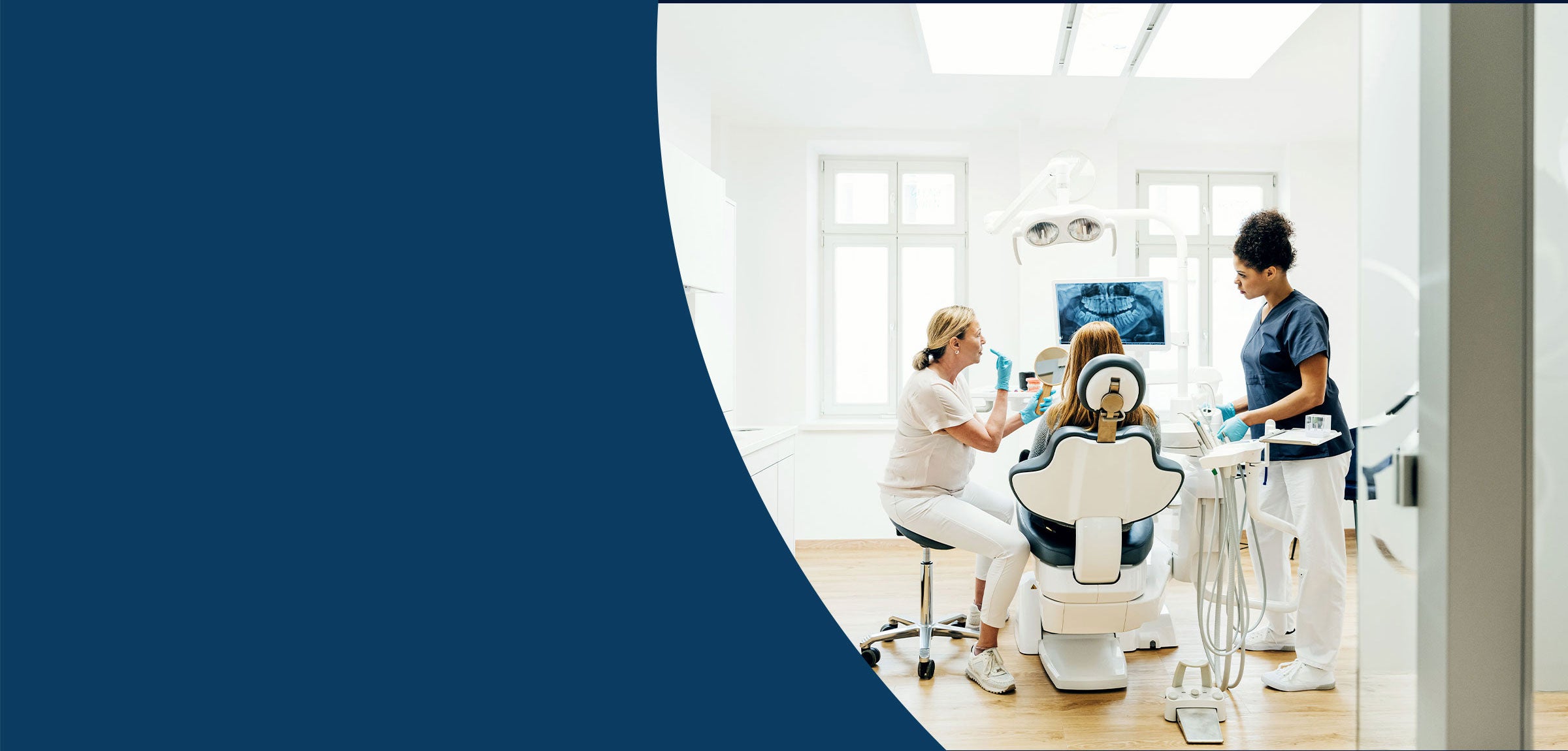 Dentist examining a patient's teeth