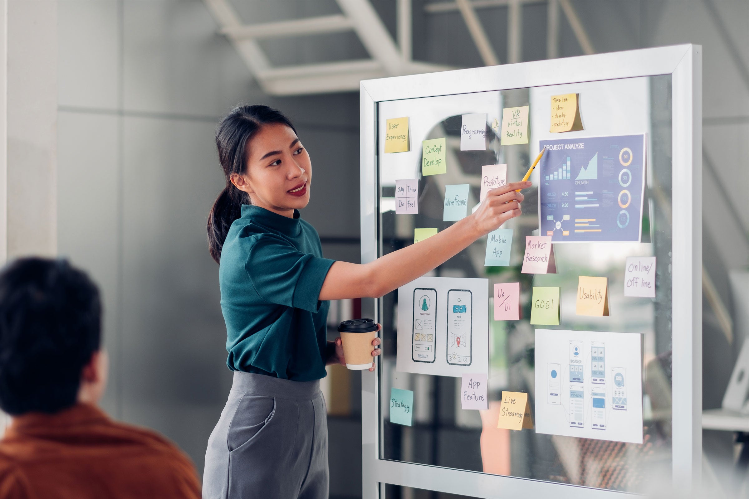 Person presenting on UI/UX for a mobile app