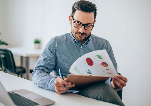 Person evaluating a report