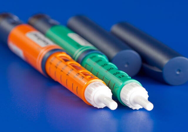 Syringes laying on a table