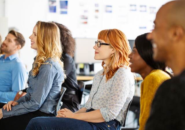 Group of people attending a presentation