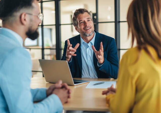Business colleagues listening during a consultation
