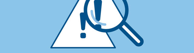 Magnified warning triangle