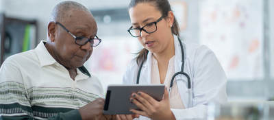 A doctor reviewing results with a patient