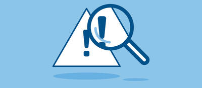 Magnified warning triangle