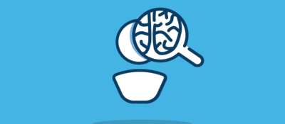 Drawing of magnifying glass looking at a brain