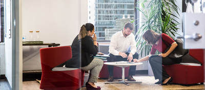 Group of people presenting in a conference room