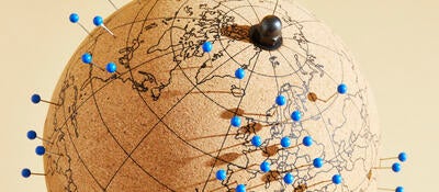 Globe with location pins