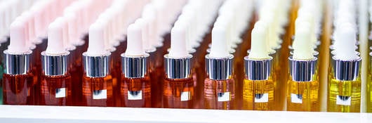 Cosmetic bottles on a shelf