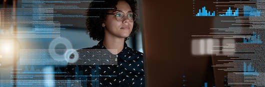 Person looking at data on futuristic looking screen