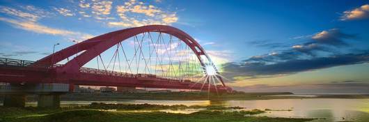 Scenic photo of suspension bridge at sunrise