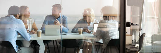 Coworkers attending meeting