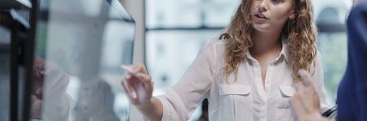 Businesswoman giving presentation.
