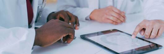 healthcare professionals over tablet