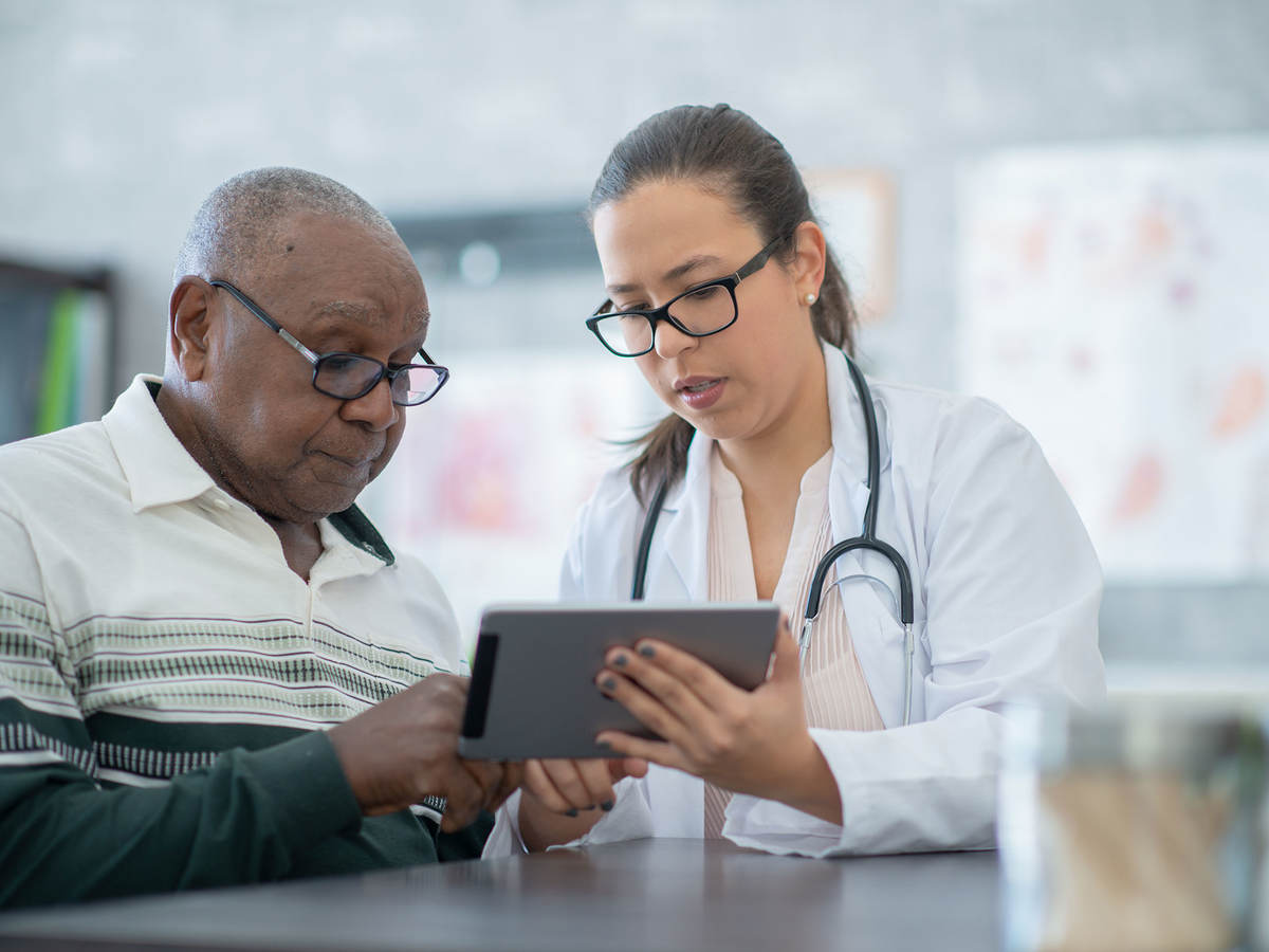 A doctor reviewing results with a patient