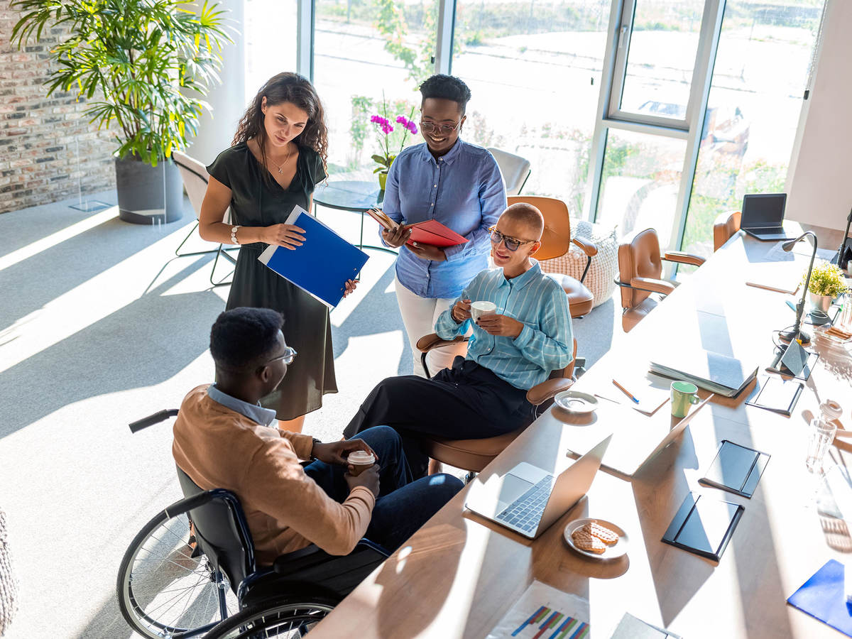 Two people in an office having a discussion