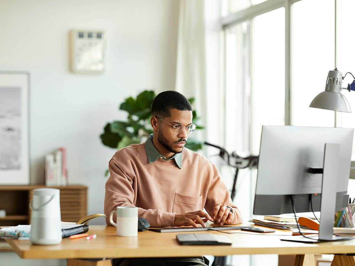 Person at computer attending a webinar