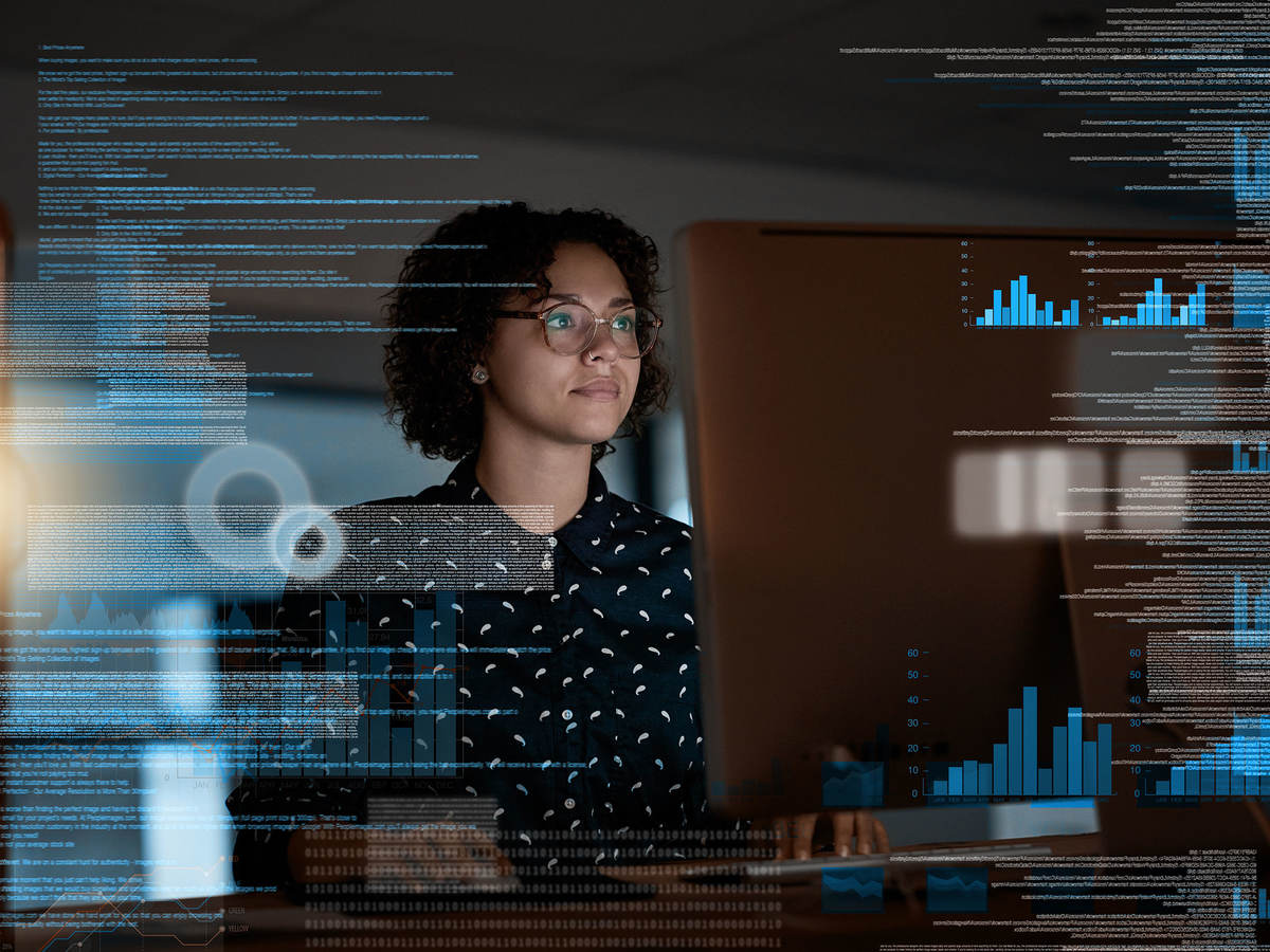 Person looking at data on futuristic looking screen