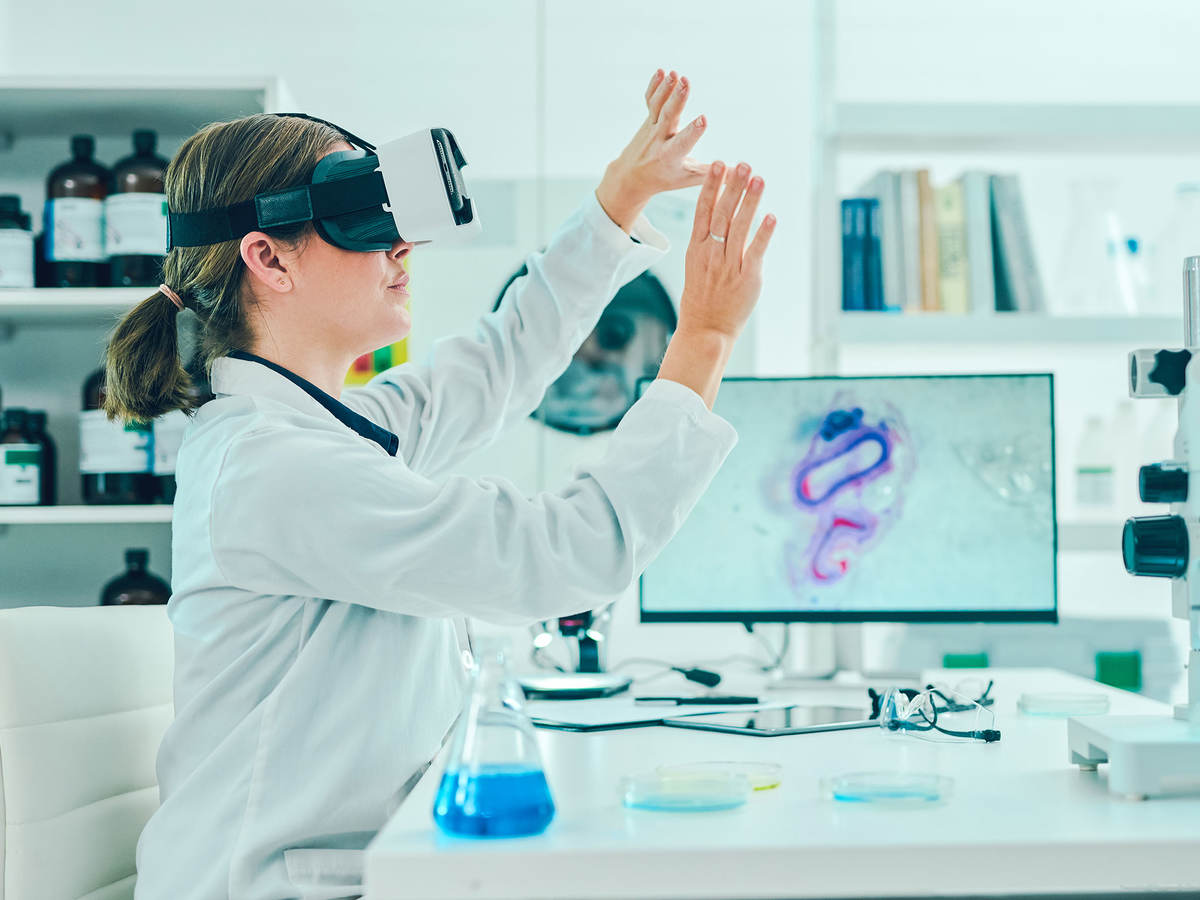 A doctor in a lab testing a medical device