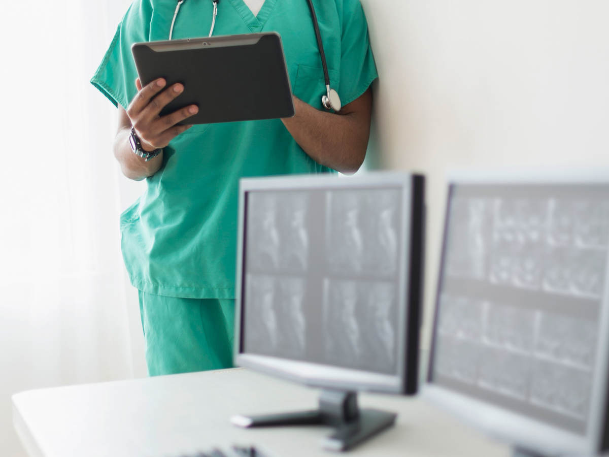 Nurse looking at x-rays