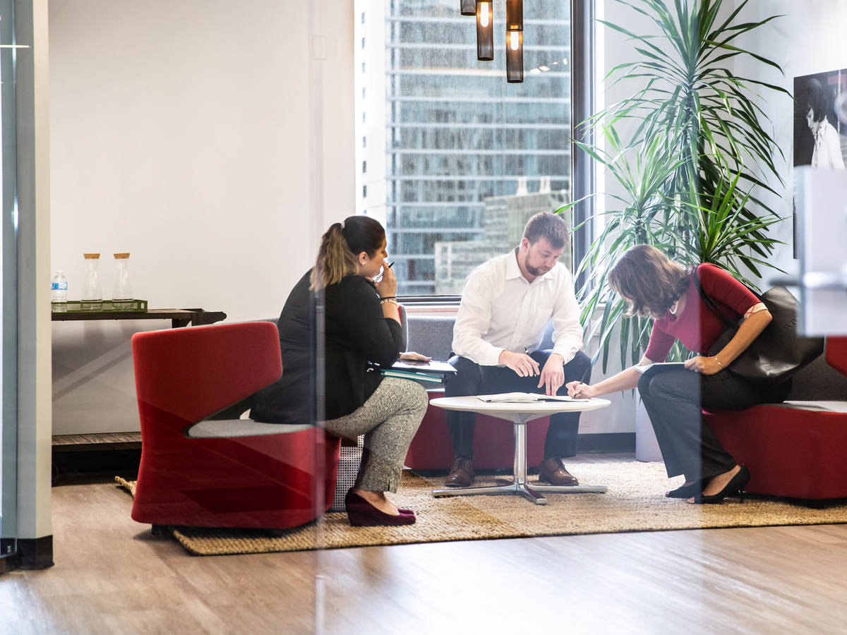 Group of people presenting in a conference room