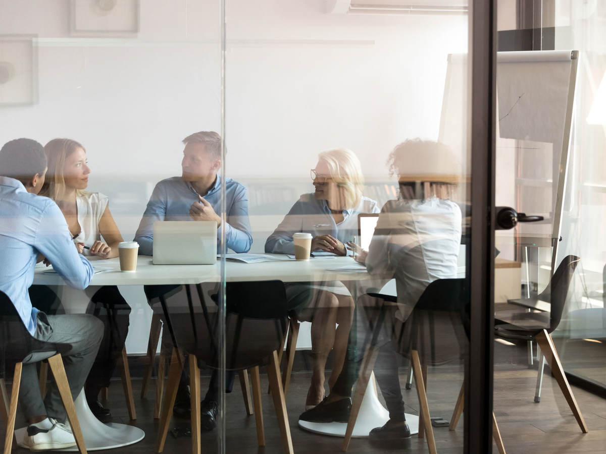 Coworkers attending meeting