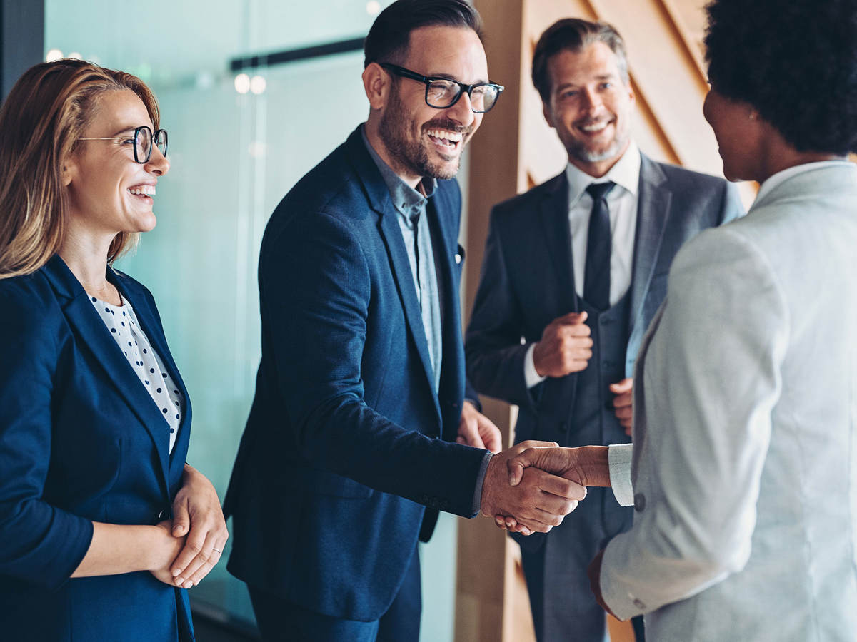 Business colleagues shaking hands