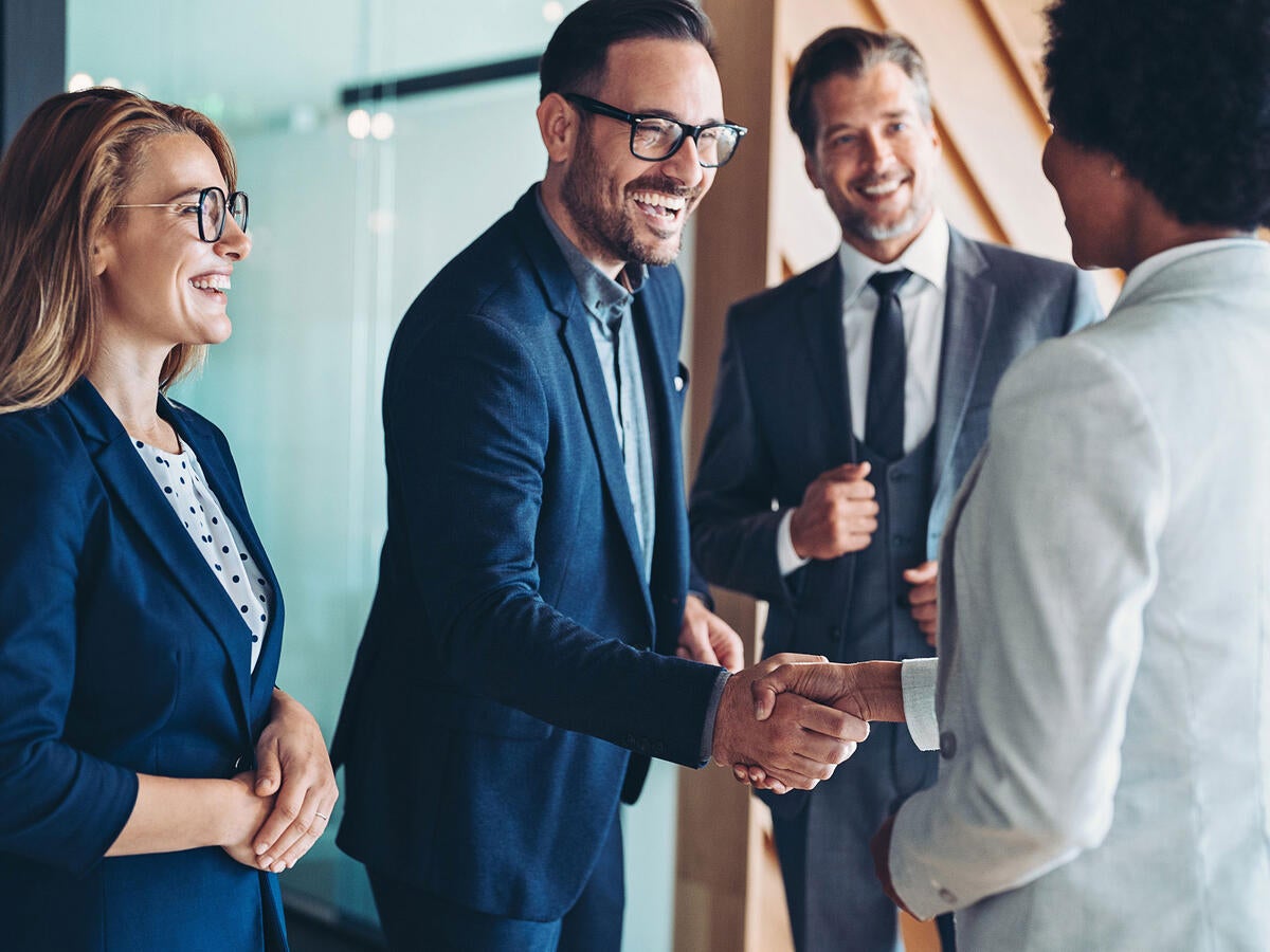 Business colleagues shaking hands