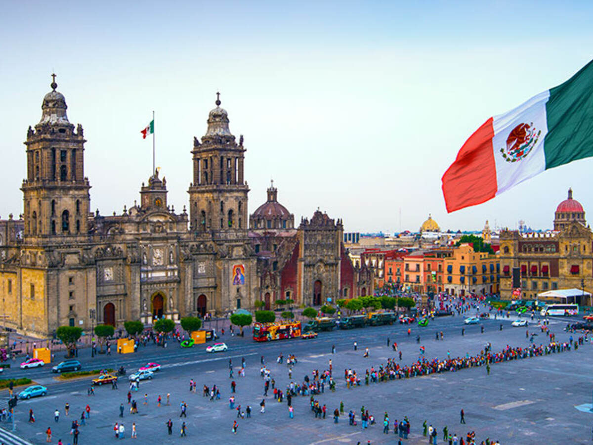 The Mexican flag waving at Zócalo in Mexico City