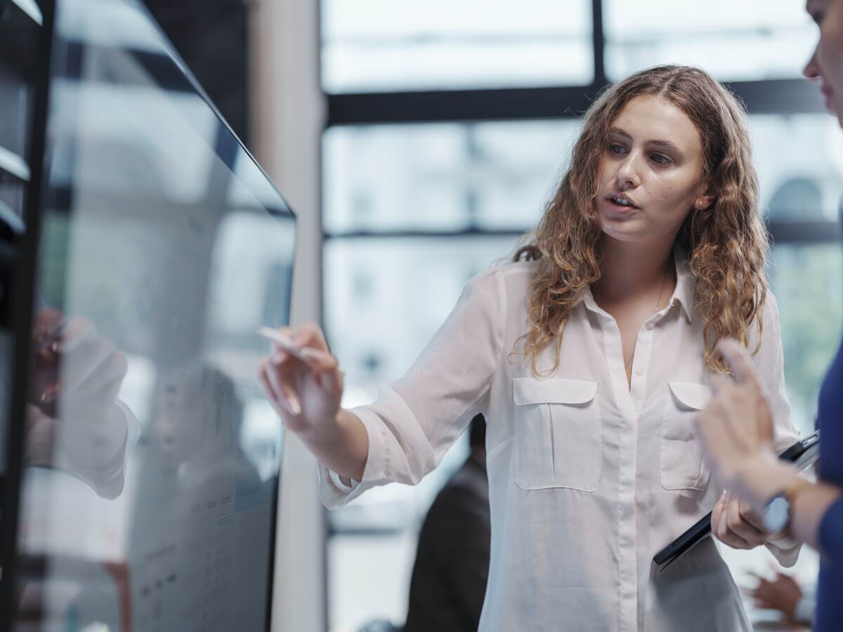 Businesswoman giving presentation.