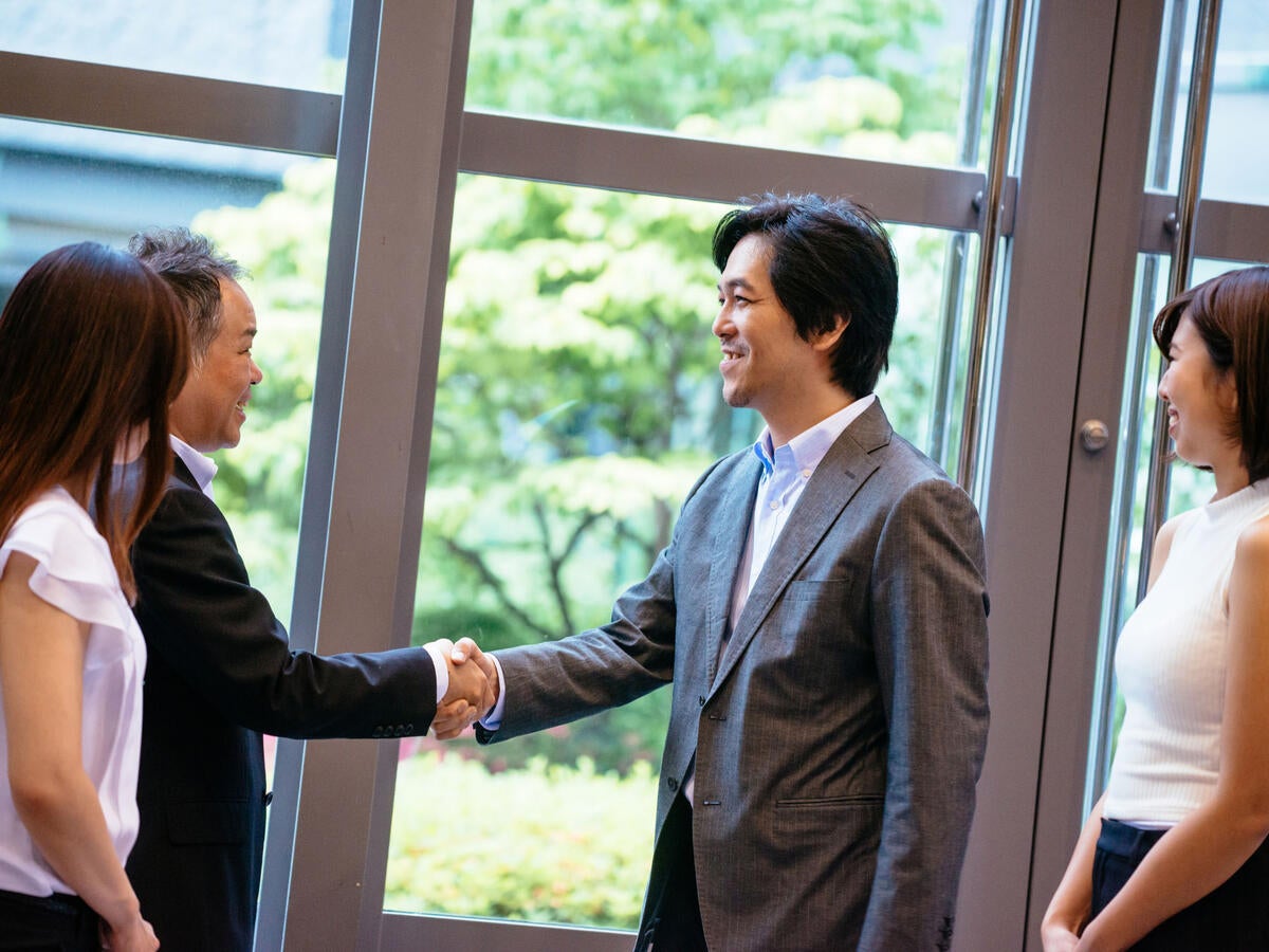 Two business colleagues shaking hands
