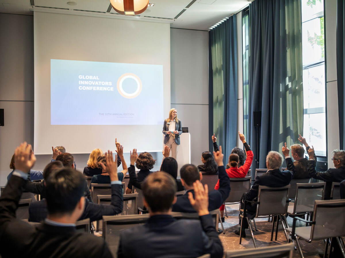 Group of people attending a presentation