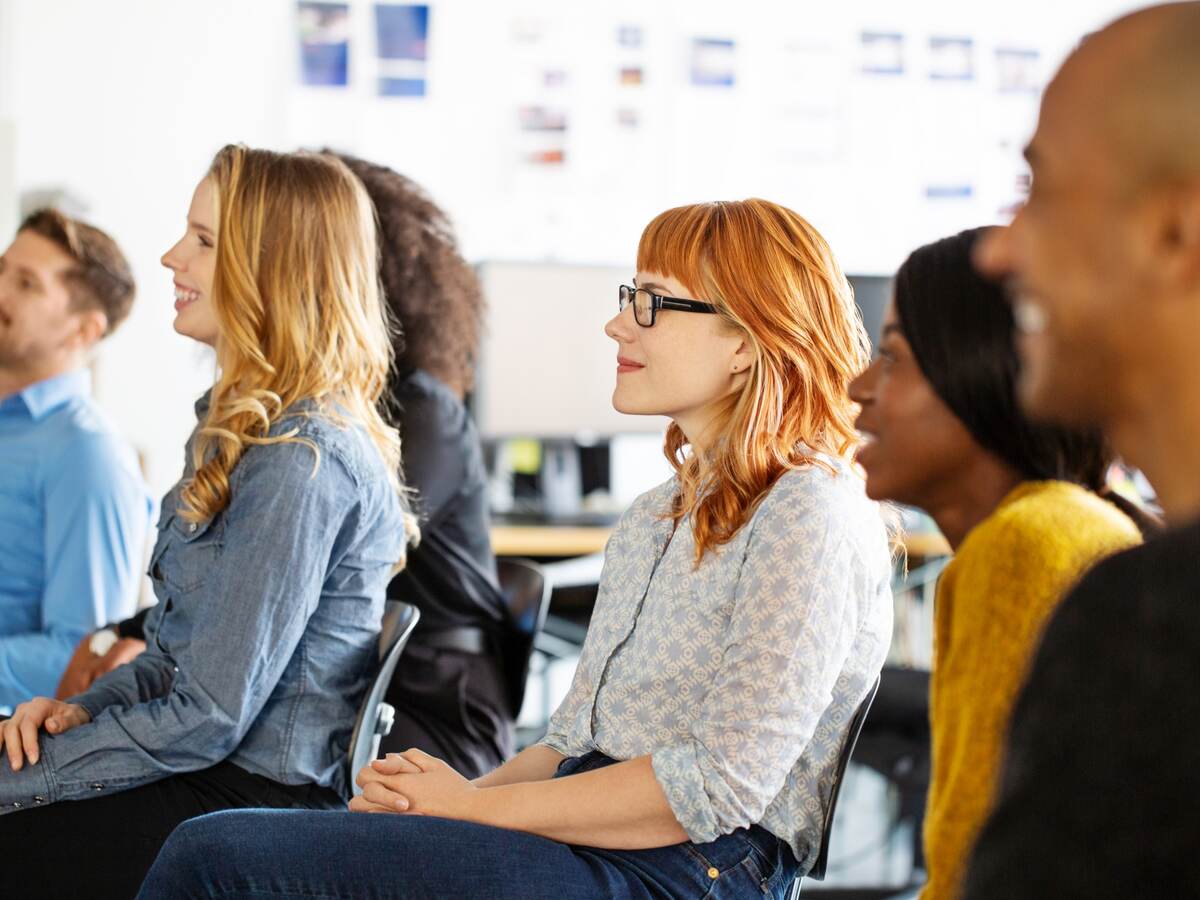 Group of people attending a presentation