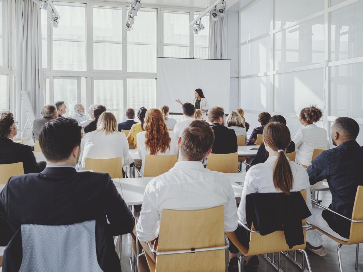 Group of business professionals attending a presentation