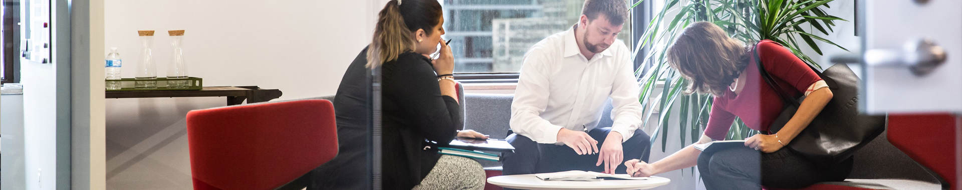 Group of people presenting in a conference room