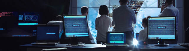 People in an office viewing data