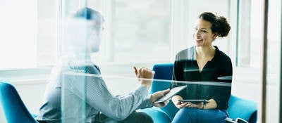 Person consulting someone else