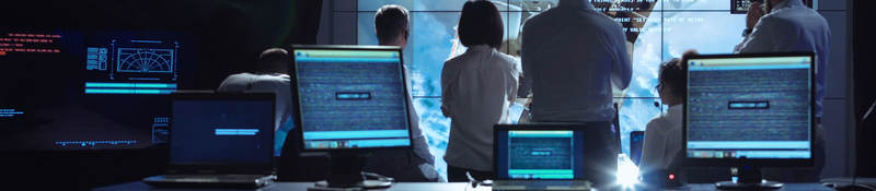 People in an office viewing data
