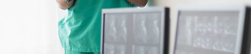 Nurse looking at x-rays