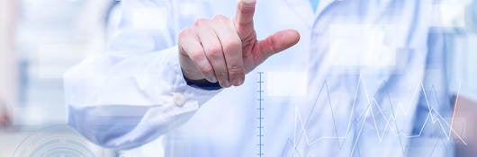 Person touching a graphic interpretation of a medical touch screen