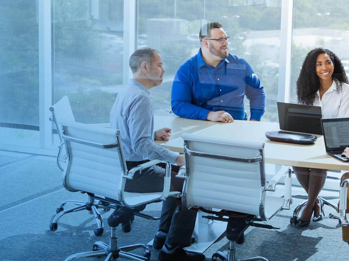 People sitting in a conference room having a meeting