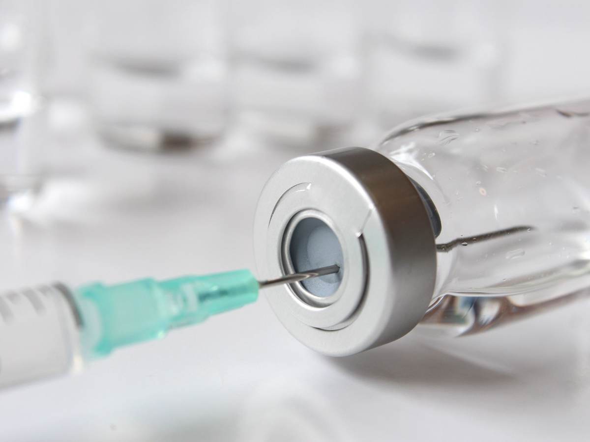 Syringe in a vial.